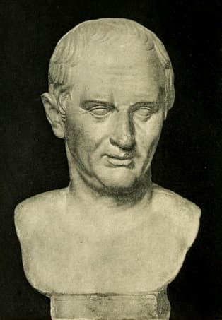 Buste romain antique en marbre de Cicéron, montrant un homme d'âge mûr aux cheveux courts et à l'expression sévère.