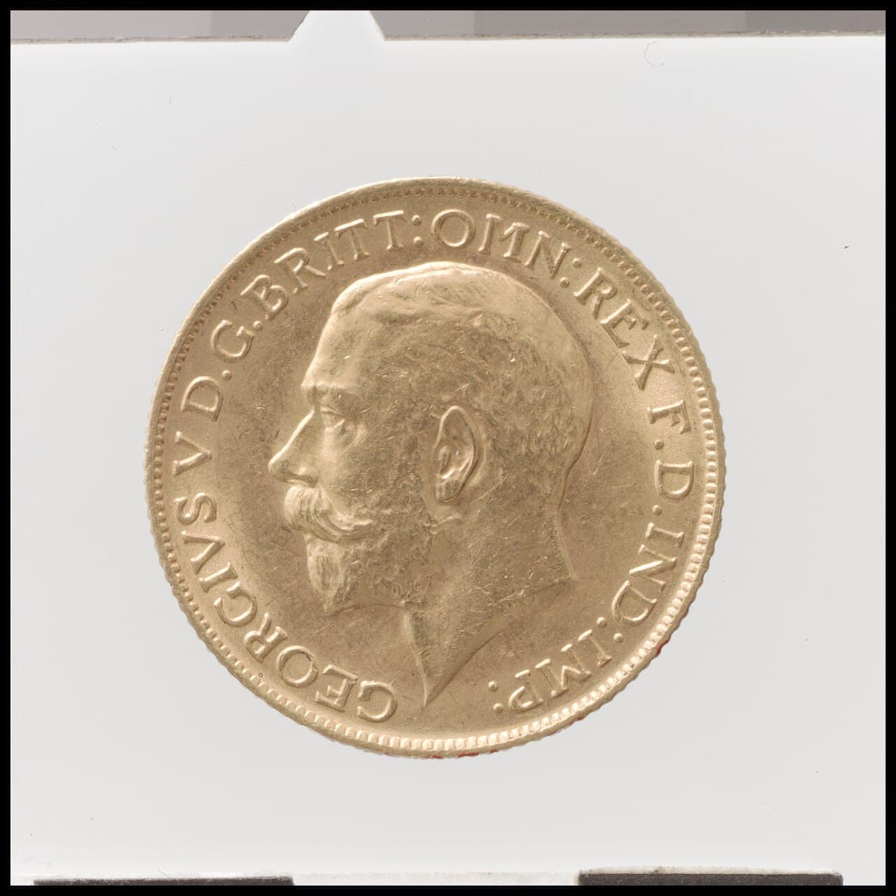Une pièce d'or, un souverain, montrant le profil du roi George V.