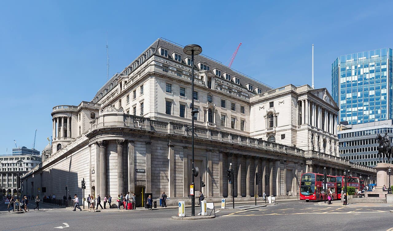 The windowless stone facade of the Bank of England building in the City of London.