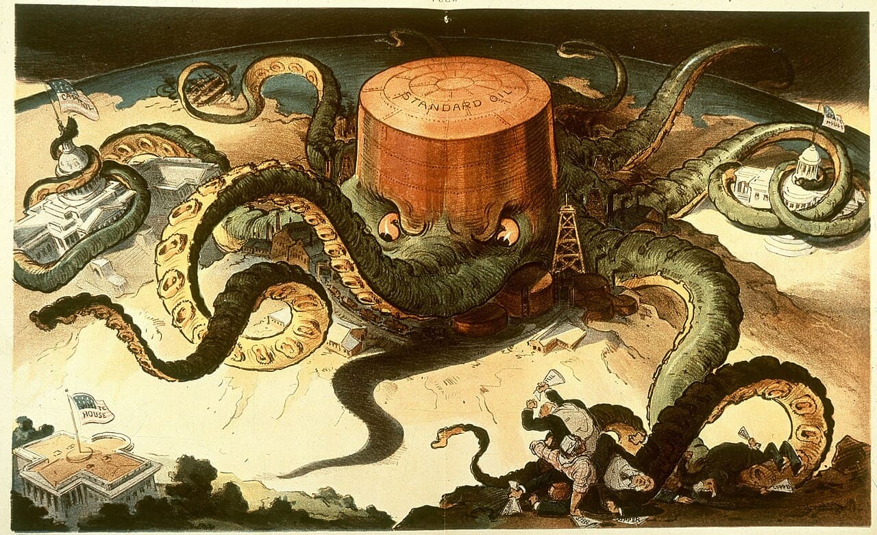 A political cartoon showing a Standard Oil storage tank as a giant octopus, its tentacles wrapped around the steel, copper, and shipping industries, a state capitol, the US Capitol, and reaching toward the White House.