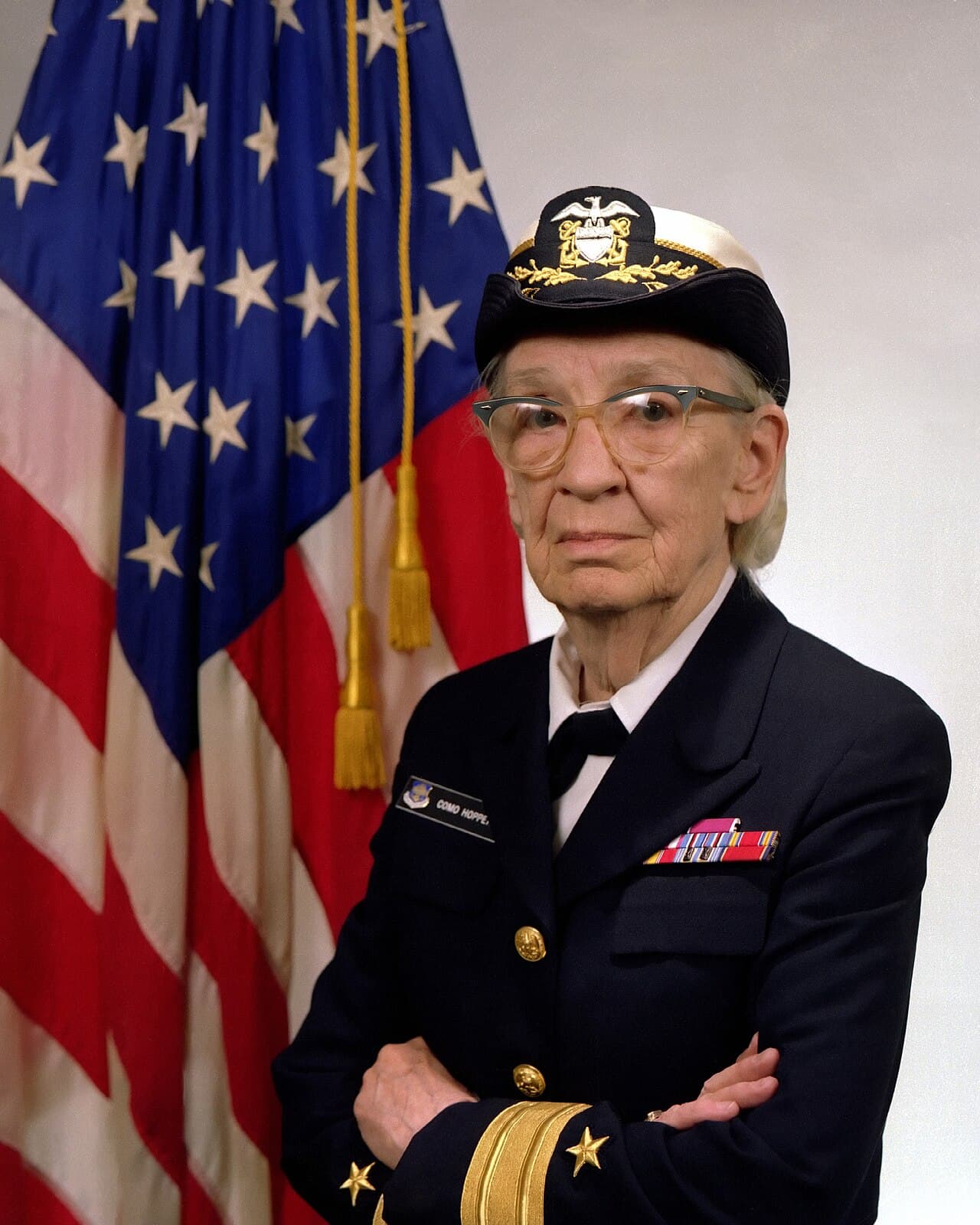 Official portrait of Grace Hopper in US Navy uniform and cap.